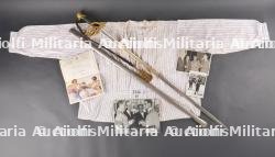 Ensemble sabre, documents et chemise de prisonnier du Colonel Leblanc des Chasseurs Ardennais. Set including sabre, documents and prisoner shirt of Colonel Leblanc from the Ardennes Chasseurs — photo 1