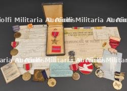 Document et décoration de George J Mc Donough 309th Medical Battalion. Document and decoration of George J. McDonough, 309th Medical Battalion. — photo 1