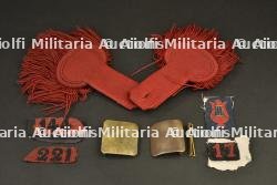 Lot de pattes de col, chiffre de képi, épaulettes et boucles de ceinturon début de guerre.