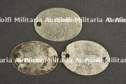 Lot de trois plaques d'identités de tirailleurs indigènes