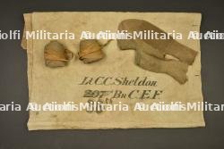 Paillasse du Lieutenant C.C Sheldon du 38th Battalion CEF, cagoule en laine et bandes molletières