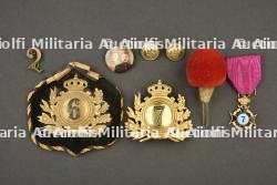 Insignes, medailles et souvenirs des 5e, 6e et 7e regiments de ligne d’Anvers. Badges, medals and memorabilia of the 5th, 6th and 7th Line Regiments of Antwerp.