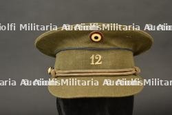 Kepi d officier subalterne du 12e regiment de ligne. Junior officer s kepi of the 12th Line Regiment.